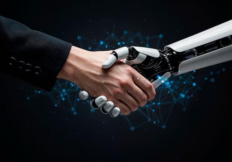 A human and a robotic hand meeting on a working agreement
